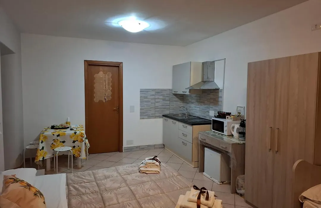 Le Lumìe L' antico Cortile Camere Con Cucina Privata With Private Kitchen-1